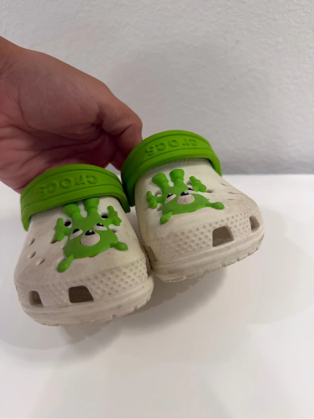 CROCS White Kids Clogs with Bright Green Monster Accents